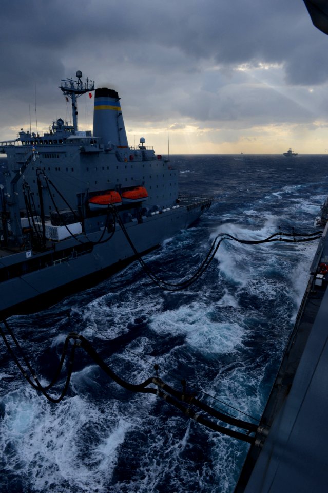 The amphibious transport dock ship USS Mesa Verde (LPD 19), right, conducts a replenishment at sea with the fleet replenishment oiler USNS John Lenthall (T-AO 189) in the Mediterranean Sea March 12, 2014 140312-N-BD629-141