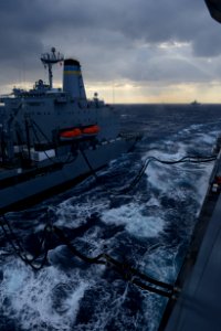 The amphibious transport dock ship USS Mesa Verde (LPD 19), right, conducts a replenishment at sea with the fleet replenishment oiler USNS John Lenthall (T-AO 189) in the Mediterranean Sea March 12, 2014 140312-N-BD629-141