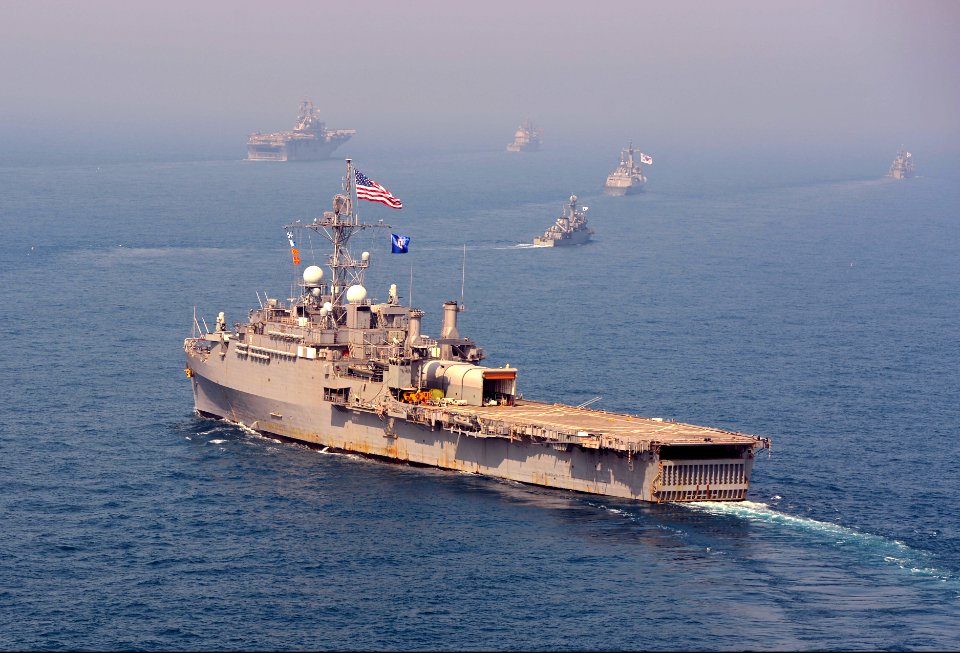 The amphibious transport dock ship USS Denver (LPD 9), front, a part of the Bonhomme Richard Amphibious Ready Group, transits the East China Sea with Republic of Korea Navy ships during a photo exercise 140327-N-BJ178-189