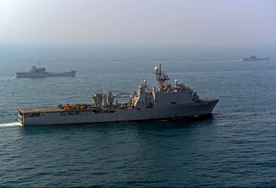 The amphibious transport dock ship USS Denver (LPD 9), front, and other ships assigned to the Bonhomme Richard Amphibious Ready Group are underway with Republic of Korea Navy ships during a photo exercise in 140327-N-BJ178-789