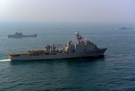 The amphibious transport dock ship USS Denver (LPD 9), front, and other ships assigned to the Bonhomme Richard Amphibious Ready Group are underway with Republic of Korea Navy ships during a photo exercise in 140327-N-BJ178-789