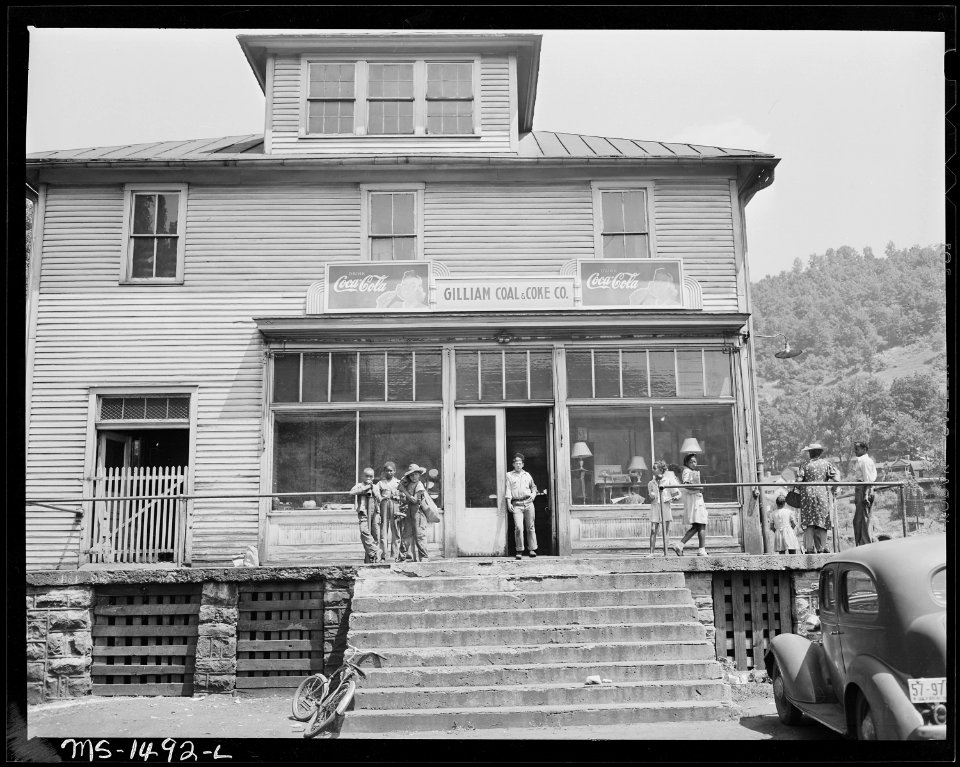 The company store. Many families in this camp shop in nearby town where better quality and selection of merchandise... - NARA - 540817