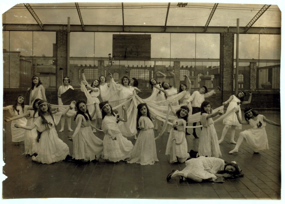 The dance of the Children of the Sunshine with Ellen sleeping in the foreground. (-4140- Miss Mackay's Pageant Children of Sunshine and Shadow as presented at Washington Irving High School. LOC cph.3a29801