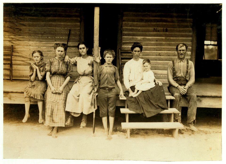 The Duncan Family, West Point, Miss. All in the cotton mill except mother and babe. The boy, Bill, said, 'I'm fifteen now. Been workin' in this mill eight years. Wasn't no law fer little LOC nclc.02124