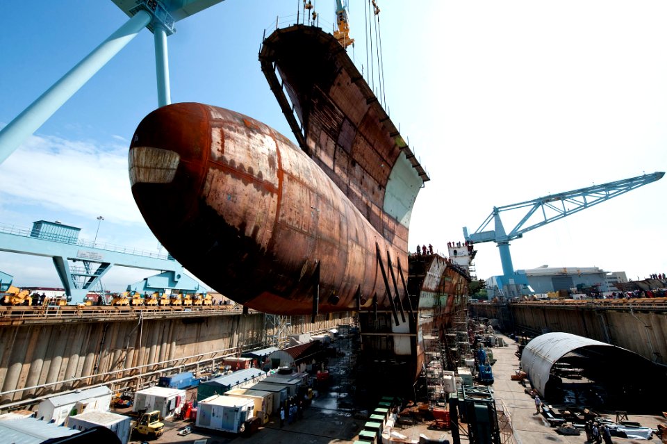 The final keel section of the future USS Gerald R. Ford (CVN 78) is lowered into place. (7269154208)