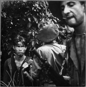 The French Foreign Legion is playing the major combat role in the war against the Vietminh. Here a red-suspect has been - NARA - 541969