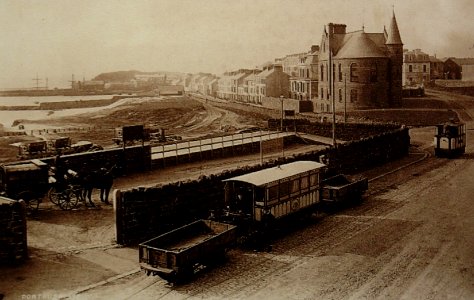 The Giant's Causeway Tram at Portrush. In built-up areas was initially the steam locomotive shown at the right was used instead of using electric power