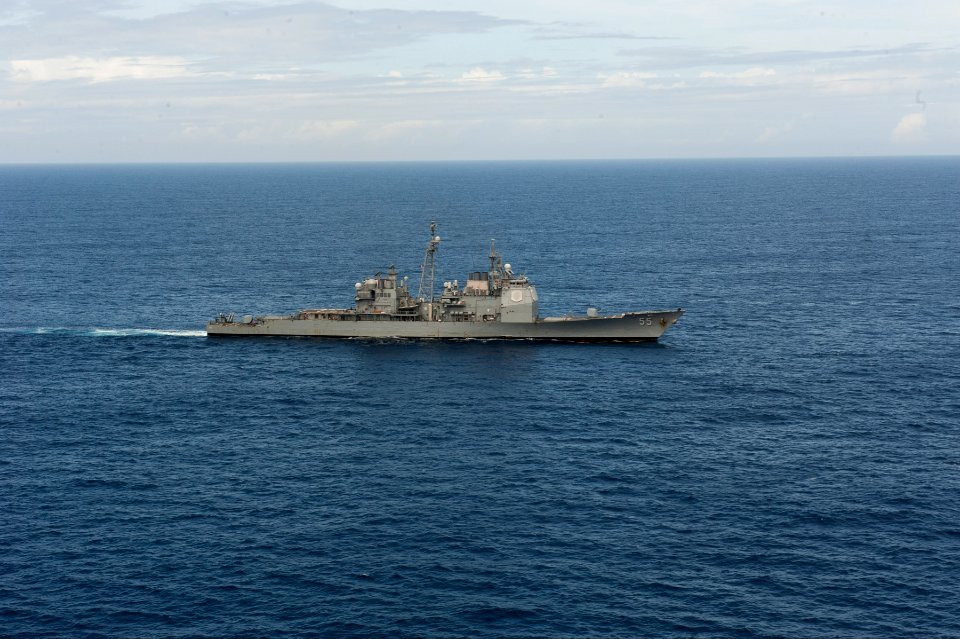 The guided missile cruiser USS Leyte Gulf (CG 55) transits the Atlantic Ocean March 19, 2014, in support of exercise Joint Warrior 14-1 140319-N-WX580-174 photo