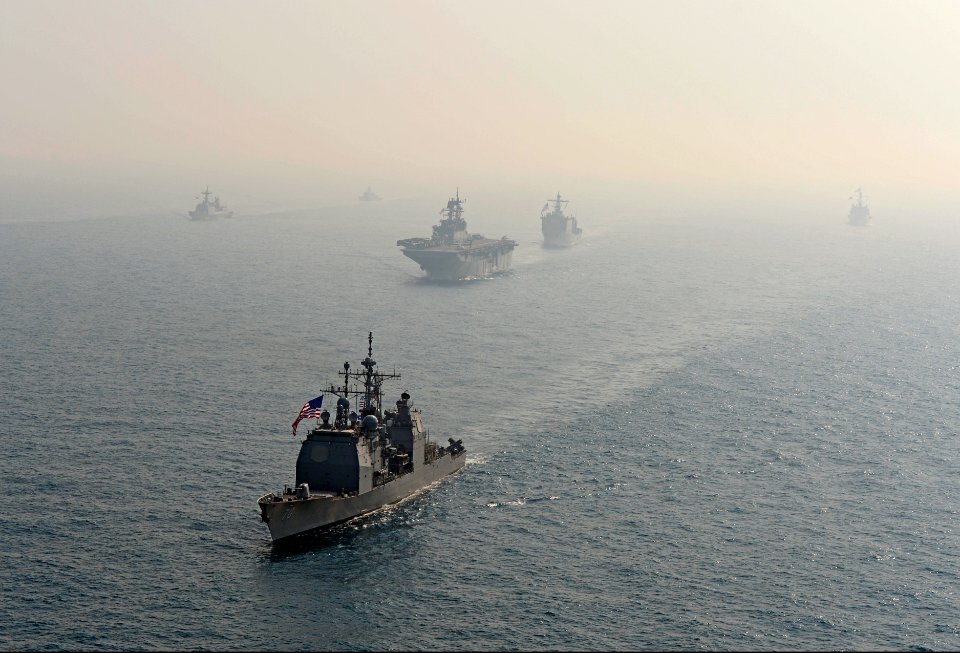 The guided missile cruiser USS Lake Erie (CG 70), foreground, transits the East China Sea with ships assigned to the Bonhomme Richard Amphibious Ready Group and South Korean navy ships during a photo exercise 140327-N-BJ178-263