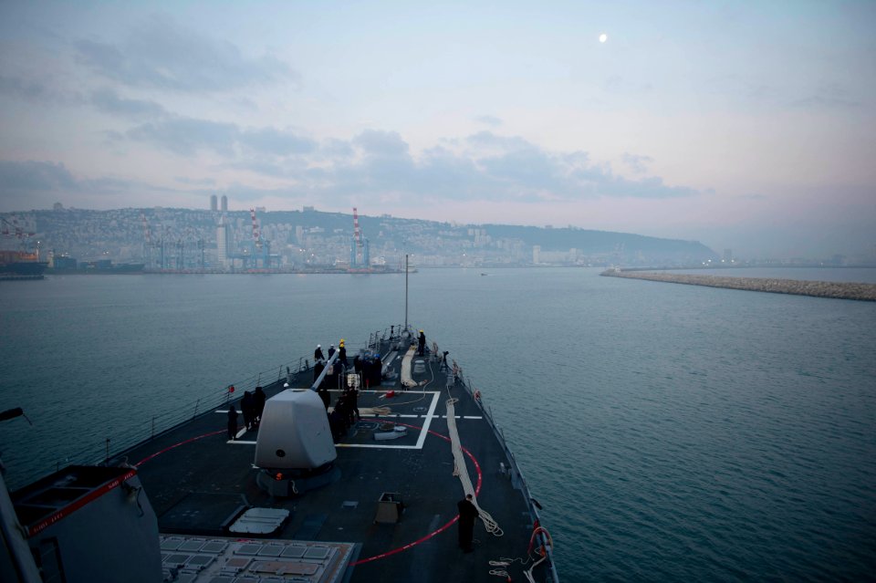 The guided missile destroyer USS Stout (DDG 55) prepares to pull into port in Haifa, Israel, Jan. 19, 2014, for a scheduled port visit 140119-N-UD469-228