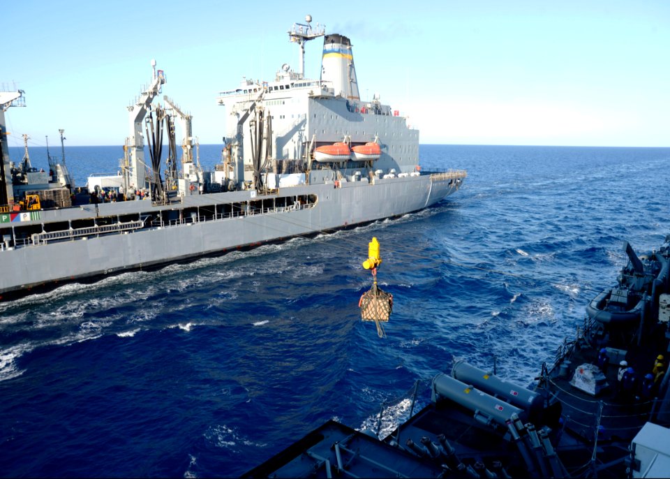 The guided missile destroyer USS Ramage (DDG 61), right, receives cargo during a replenishment at sea with the fleet replenishment oiler USNS John Lenthall (T-AO 189) in the Mediterranean Sea March 20, 2014 140320-N-CH661-436