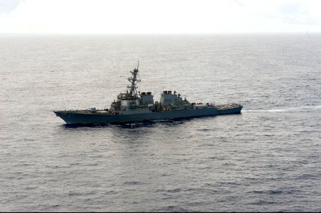 The guided missile destroyer USS Cole (DDG 67) transits the Atlantic Ocean March 19, 2014, in support of exercise Joint Warrior 14-1 140319-N-WX580-182 photo