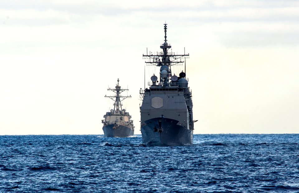 The guided missile cruiser USS Vella Gulf (CG 72), left, and the guided missile destroyer USS James E. Williams (DDG 95), both assigned to Destroyer Squadron 26, travel in the Atlantic Ocean March 18, 2014 140318-N-WX580-014