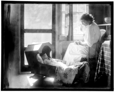 The hand that rocks the cradle, a study with Beatrice Baxter Ruyl, about 1905 LCCN2006684242