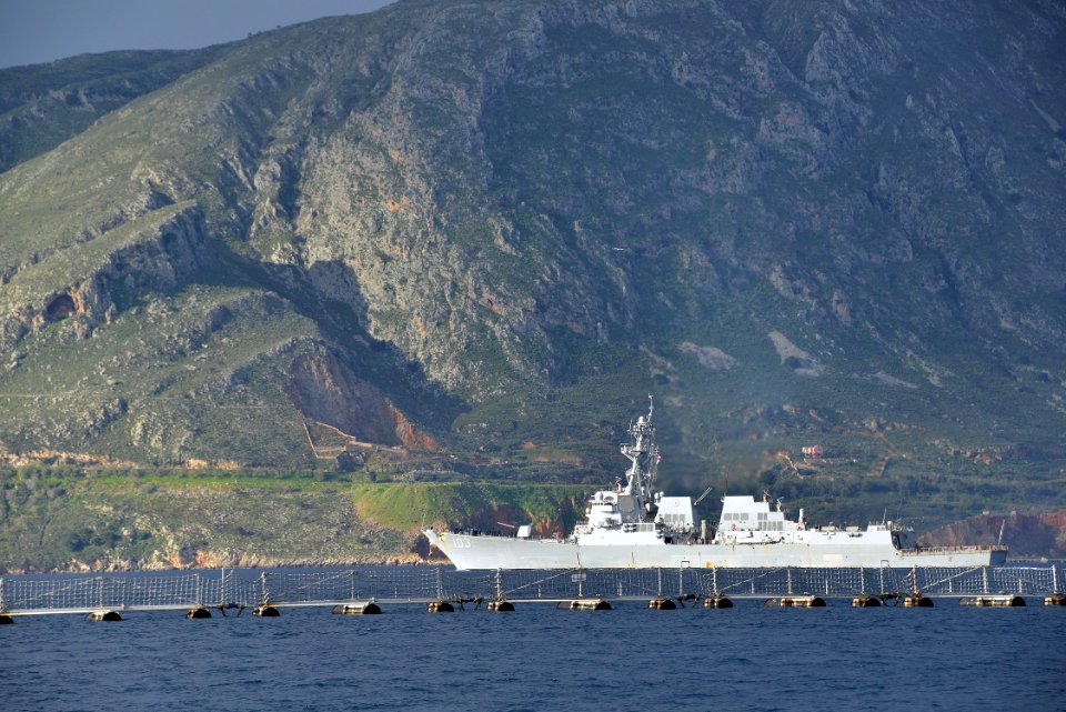 The guided missile destroyer USS Truxtun (DDG 103) departs the Marathi NATO pier facility following a scheduled port visit to Souda Bay, Greece, March 6, 2014 140306-N-MO201-155