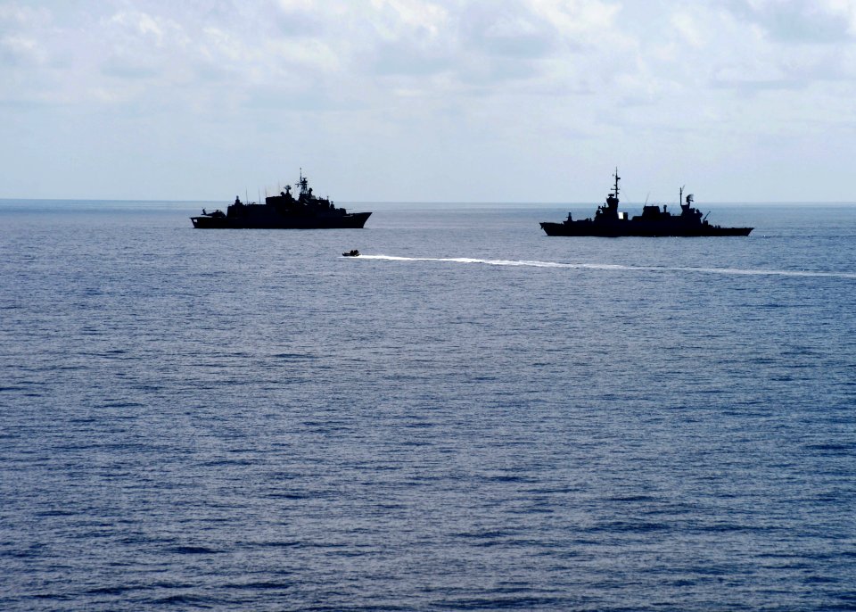 The guided missile destroyer USS Ramage (DDG 61) conducts small boat operations with the Greek frigate HS Salamis (F 455) and the Israeli navy corvette INS Eilat (501) in the Mediterranean Sea April 9, 2014 140409-N-CH661-650