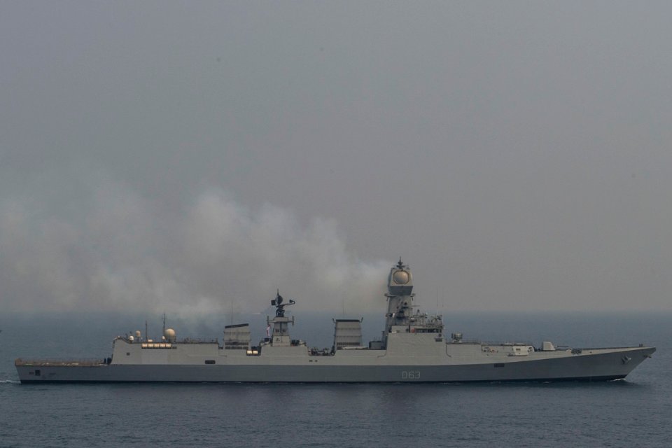 The Indian Navy destroyer INS Kolkata (D63) and the British Navy destroyer HMS Defender (D36) steam alongside the Ticonderoga-class guided-missile cruiser USS Antietam (CG 54) during an exercise (cropped)