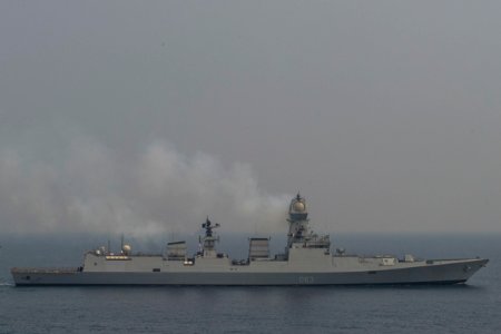 The Indian Navy destroyer INS Kolkata (D63) and the British Navy destroyer HMS Defender (D36) steam alongside the Ticonderoga-class guided-missile cruiser USS Antietam (CG 54) during an exercise (cropped)
