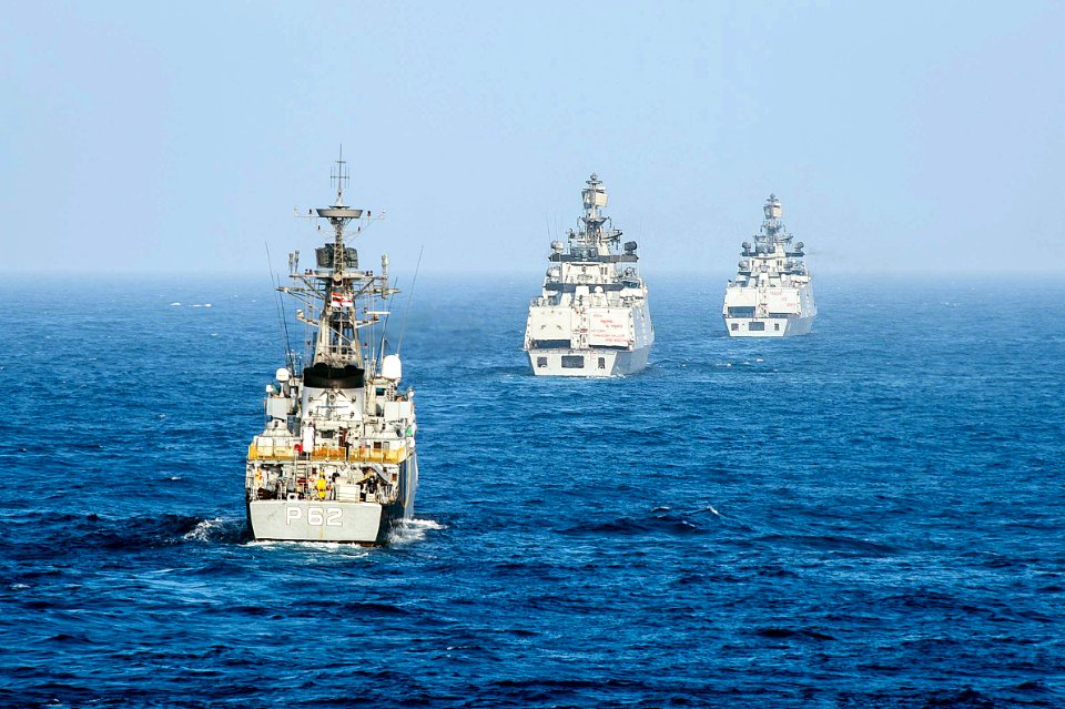 The Indian Navy Kora-class corvette INS Kirch (P62) and Shivalik-class stealth multi-role frigates INS Sahyadri (F49) and INS Satpura (F48) transit while conducting a live-fire surface gun exercise during Malabar 2016