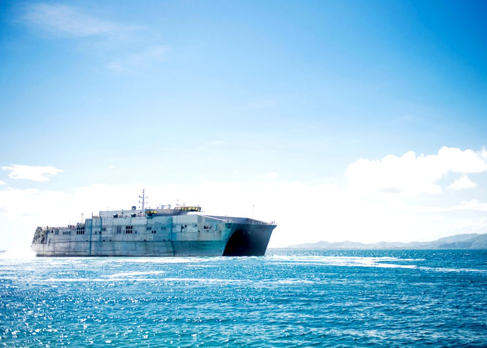 The joint high speed vessel USNS Spearhead (JHSV 1) departs from Puerto Castilla, Honduras, Sept 140902-N-XQ474-002