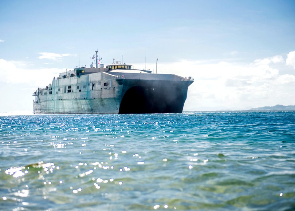 The joint high speed vessel USNS Spearhead (JHSV 1) departs from Puerto Castilla, Honduras, Sept 140902-N-XQ474-001