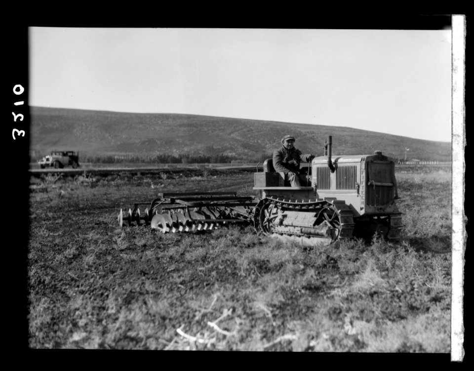 The Keren Hayesod. Agricultural Colonies on Plain of Esdraelon 'The Emek.' Tractor disc plowing on the great stretches of Esdraelon LOC matpc.15225