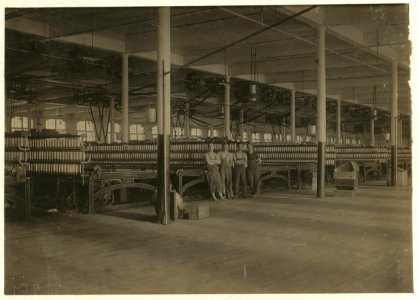 The Mule Room in the New Bedford Cotton Mill. Some small boys are employes in mule rooms. LOC nclc.02476