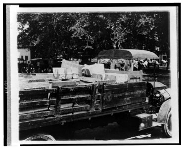 The need of an Archive Building is aptly illustrated in the removal of valuable census records today from the Dept. of Commerce to one of the temporary wooden war buildings. LCCN00649559