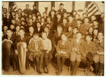 The Newsboy Club. Gathered to go to a stunt at Moving Picture Show where they were to sit on the stage. Taken at 7-30 P.M. LOC nclc.03832