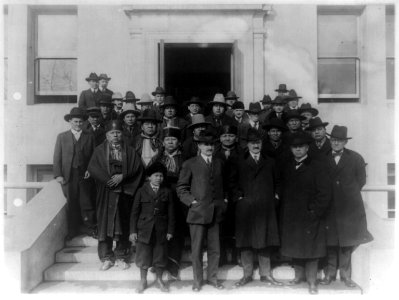 The Osage Council, with other Osage Indians, who came to Washington in connection with gas and mineral rights on the Osage Nation in Oklahoma. Commissioner of Indian Affairs Cato Sells, LCCN93515475