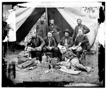 The Peninsula, Va. The staff of Gen. Fitz-John Porter; Lts. William G. Jones and George A. Custer reclining LOC cwpb.01009