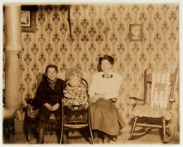The Petrino children, 290 First Ave. Peter, Mary, (baby), Katherine. Entire family spends summer working in a fruit picking center. LOC cph.3b06596