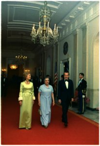 The President and Mrs. Nixon, with Israeli Prime Minister Golda Meir, in evening attire - NARA - 194492
