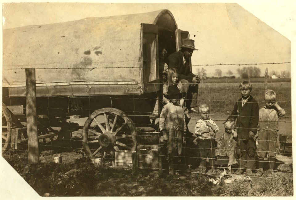The prairie-wagon home of a family of itinerant beet workers, now camped near Ft. Collins, Colo. Street family. The children 7- 8- 10- and 12 work steadily and I saw the tiny girl pulling LOC nclc.00374