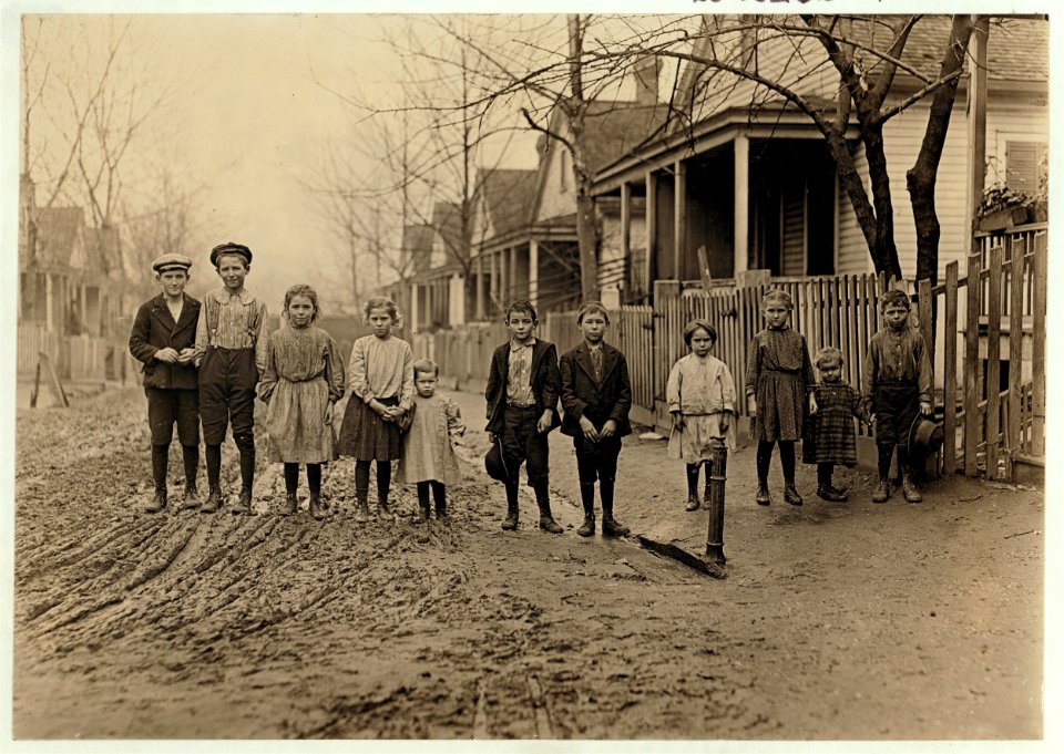 The Rising Generation, Gregtown, Augusta, where the hands in King Mill live. 'Worst part of Augusta.' Secretary of Associated Charities said. Boy with cap (left hand end) Willie Crappse in LOC cph.3a42525
