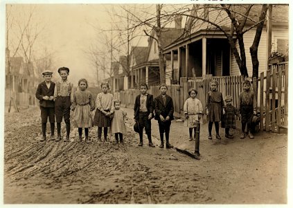 The Rising Generation, Gregtown, Augusta, where the hands in King Mill live. 'Worst part of Augusta.' Secretary of Associated Charities said. Boy with cap (left hand end) Willie Crappse in LOC cph.3a42525