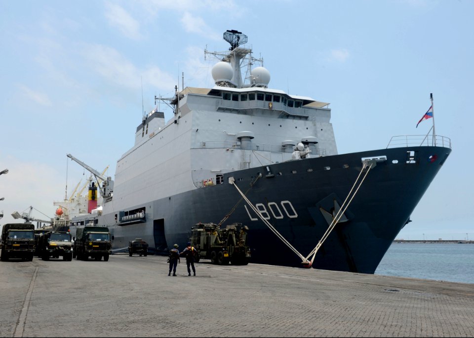 The Royal Netherlands Navy amphibious transport dock ship HNLMS Rotterdam (L800) is loaded with vehicles and cargo after arriving in Tema, Ghana, Sept 130926-N-CH661-124