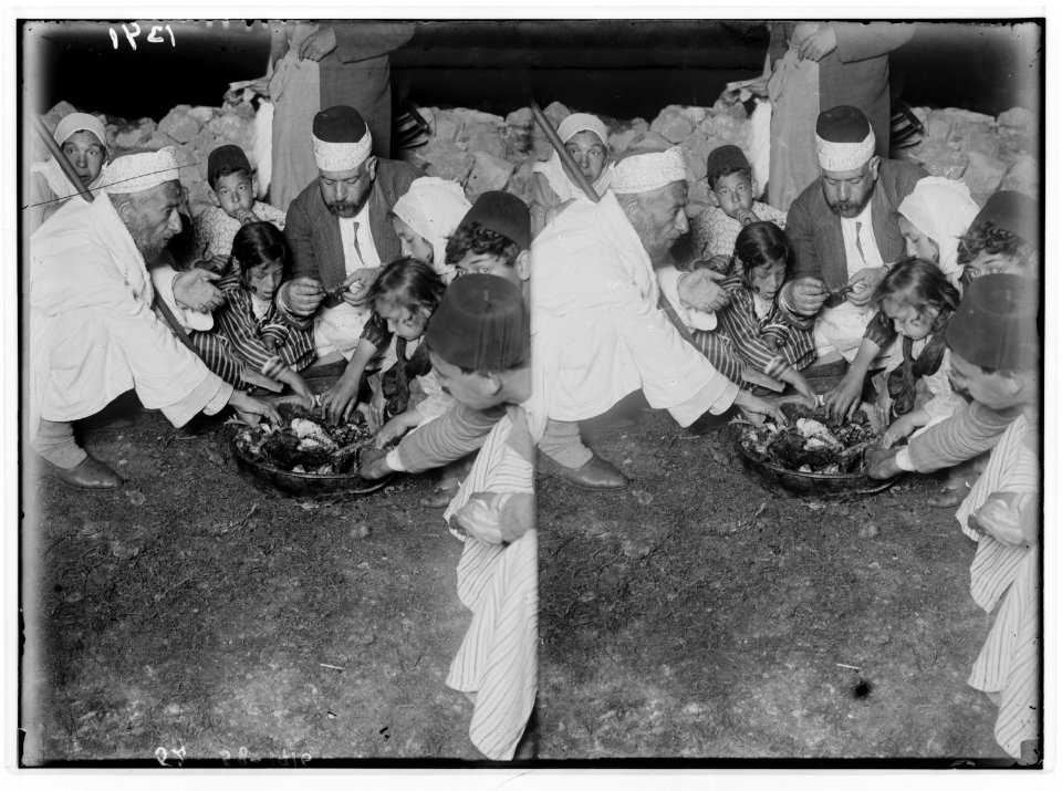 The Samaritan Passover on Mt. Gerizim. Samaritan family eating the sacrifice. LOC matpc.01862