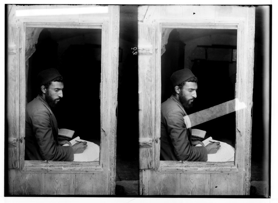 The Samaritans of Nablus (Shechhem). Samaritan writing a manuscript. LOC matpc.01832