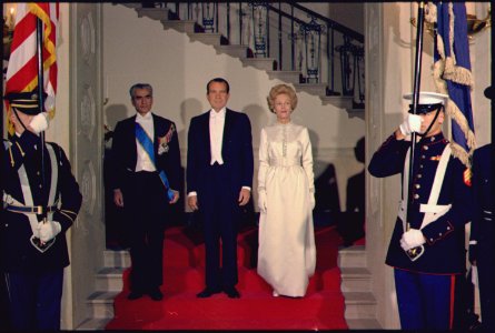 The Shah of Iran, President Nixon, and Mrs. Nixon in formal attire for a state dinner in the White House - NARA - 194302 photo