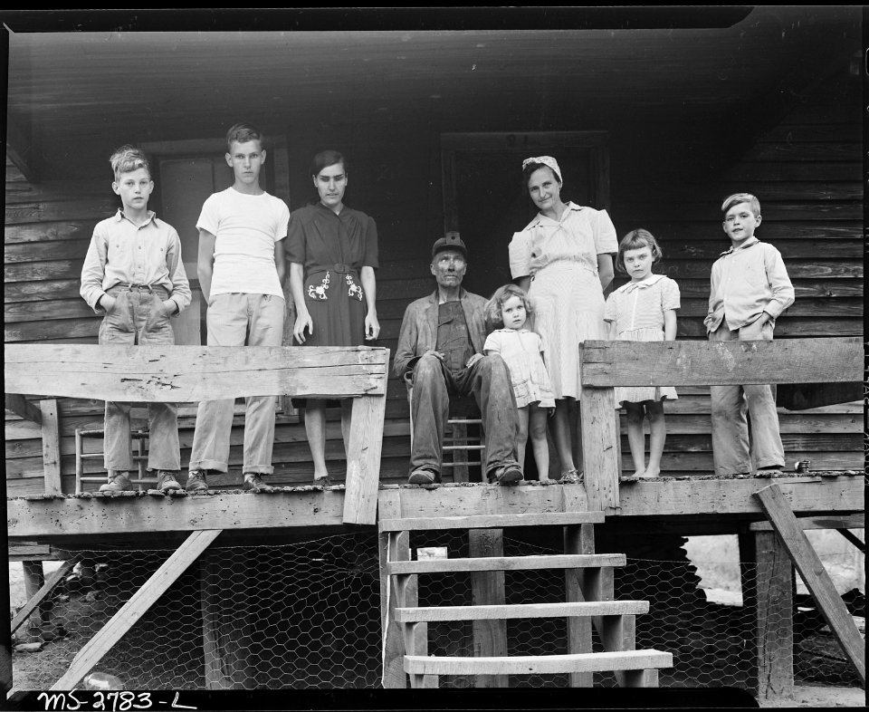 The Sergent Family on their front porch. Reading from L. to R., Franklin D., Louis, Lucy, Mr. Blaine Sergent, Bobbie... - NARA - 541371