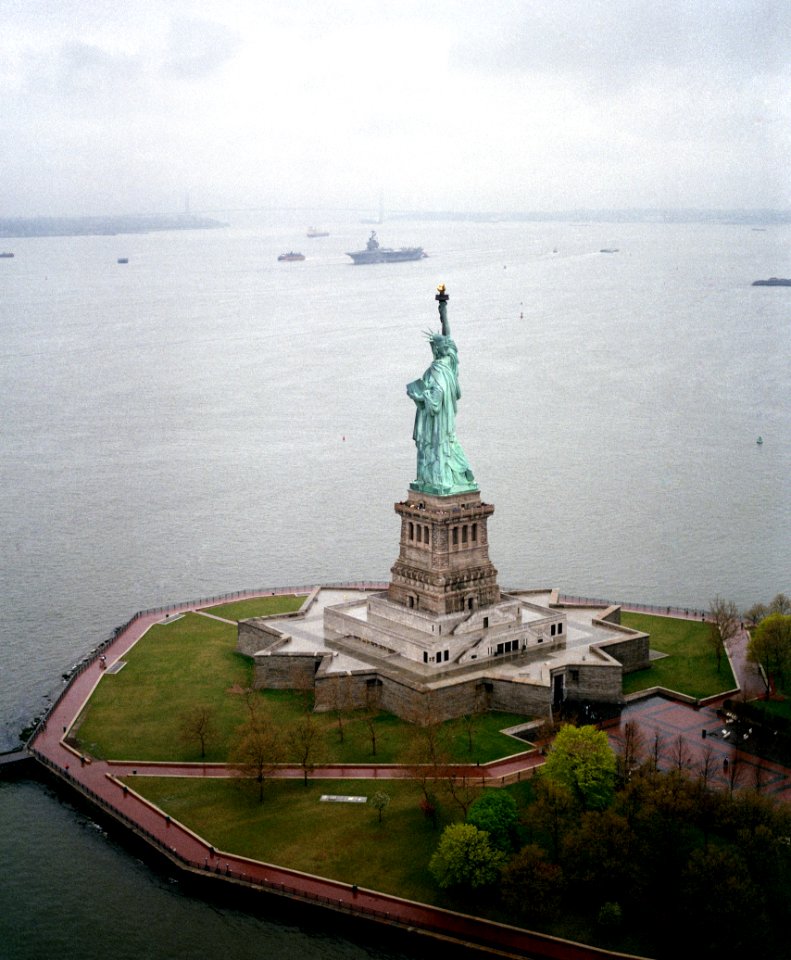 The Statue of Liberty welcomed Forrestal (CV-59) as she visited New York for Fleet Week 89 DN-SC-89-09261