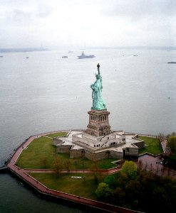 The Statue of Liberty welcomed Forrestal (CV-59) as she visited New York for Fleet Week 89 DN-SC-89-09261