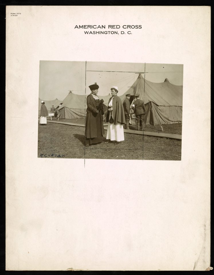 The superintendent of the nursing bureau Miss Clara D. Noyes, who is talking to a Red Cross nurse in regulation uniform, formerly was superintendent of the Bellevue Training School for LCCN2016647824