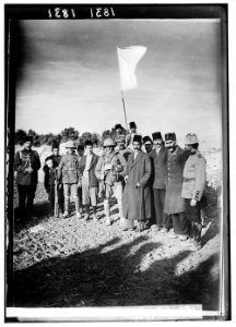 The surrender of Jerusalem to the British, December 9, 1917. The Mayor of Jerusalem, with white flag, offers surrender to two British tommies (sergeants) LOC matpc.00162
