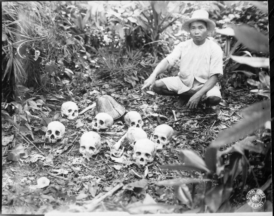 The Tapel Massacre on 1 July 1945. Picture shows Pedro Cerono, the man who discovered the group of 8 skulls. Tapel... - NARA - 531327