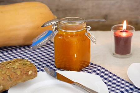 Glass pumpkin jar of jam