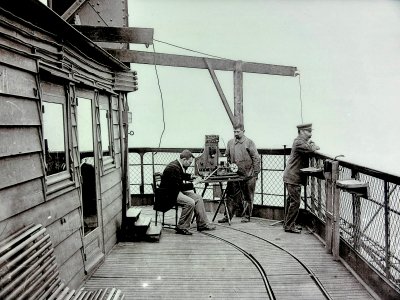 The top deck at the tower’s summit. The door on the left leads into Eiffel’s personal room (or Belvedere in French) photo