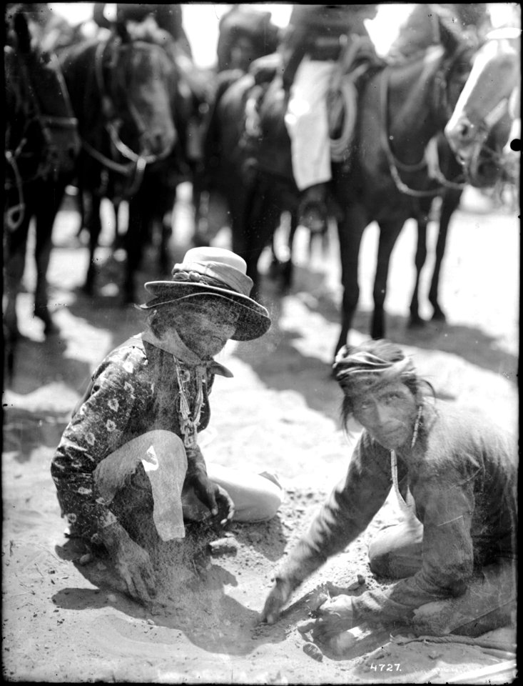 The two chiefs of the Navajos burying the rooster for the game of plucking the rooster, ca.1900 (CHS-4727)