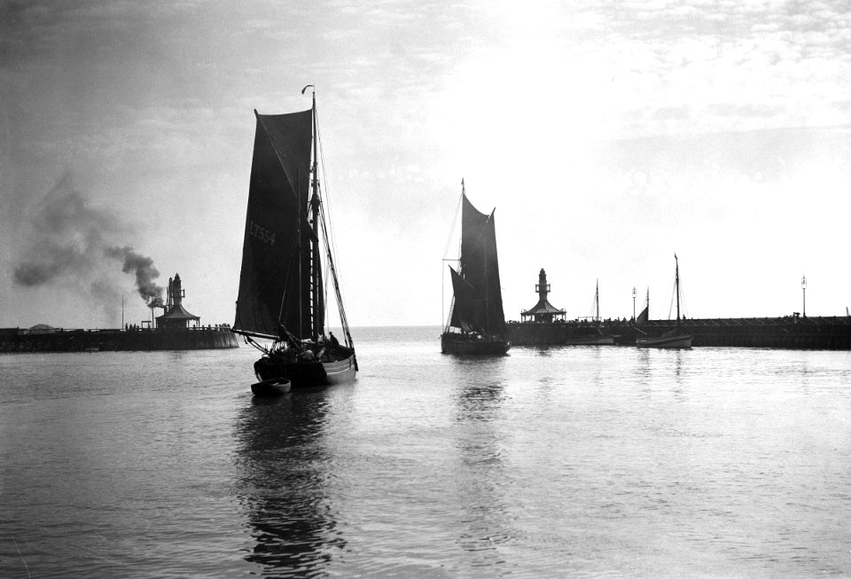 The trawler 'Prospector' (1893) with an unidentified trawler sailing out of the outer harbour. RMG P27508